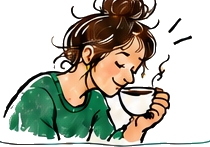 Une personne hume une tasse de café